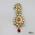 Akshay Gold Finished Pearl Kundan Kalgi Ruby